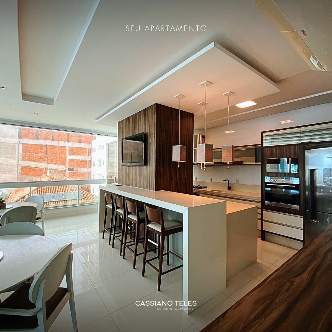 Salão de festas com mesas e integração social no Residencial Cayman.