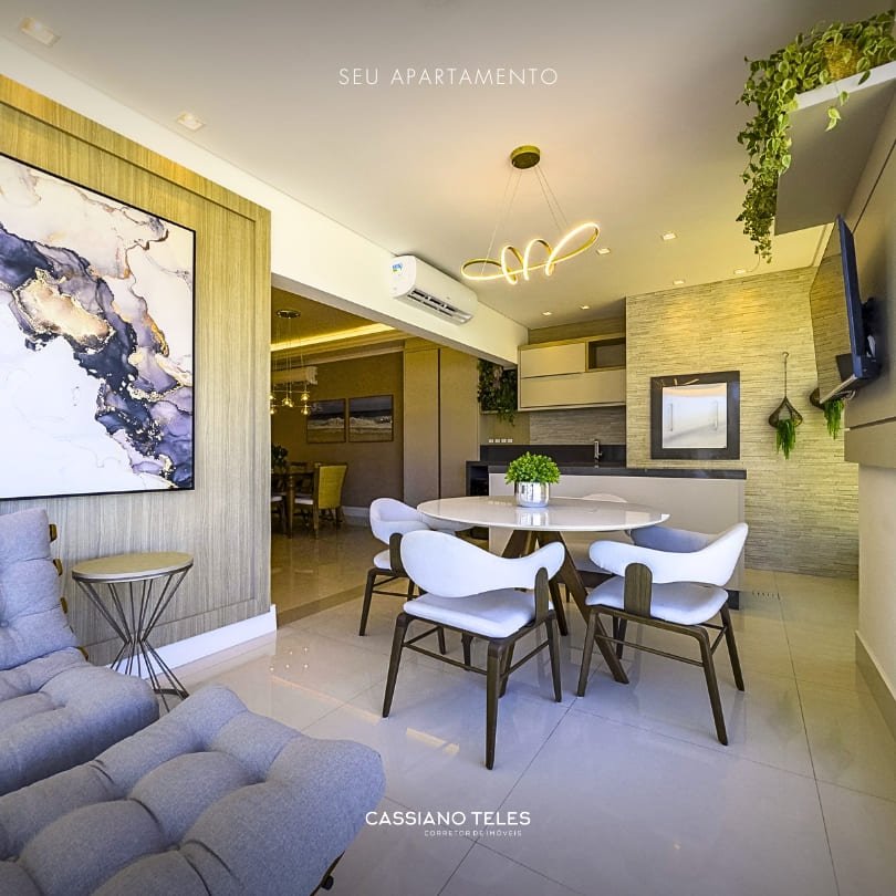 Área gourmet integrada do Apartamento à venda Itapema Le Lis Blanc com mesa redonda e iluminação moderna