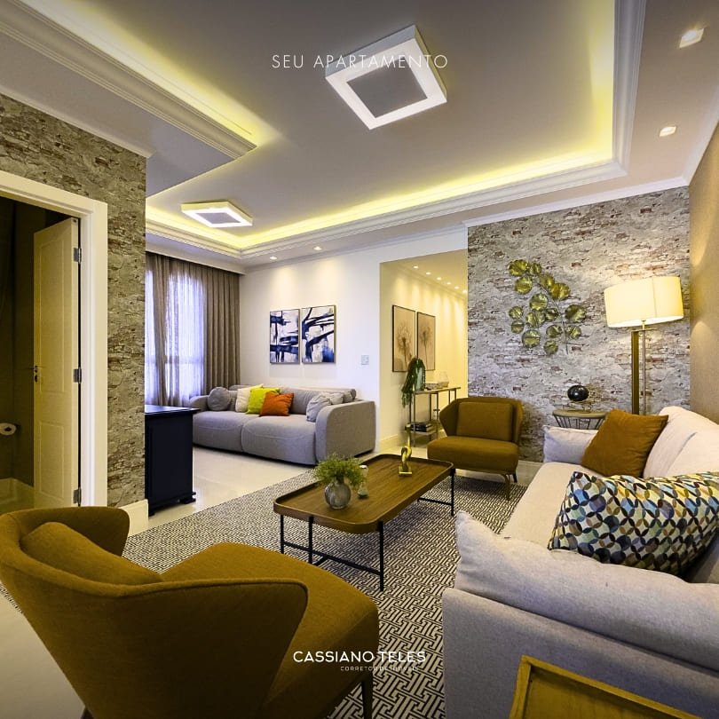 Sala integrada do Apartamento à venda Itapema Le Lis Blanc com sofá, poltronas e iluminação indireta em teto rebaixado